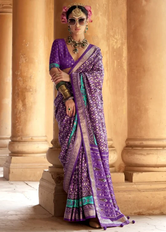 Purple Patola Silk Saree with Aqua Ikat Motifs and Silver Zari Border