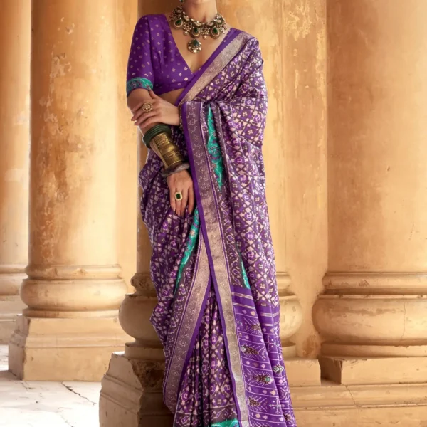 Purple Patola Silk Saree with Aqua Ikat Motifs and Silver Zari Border